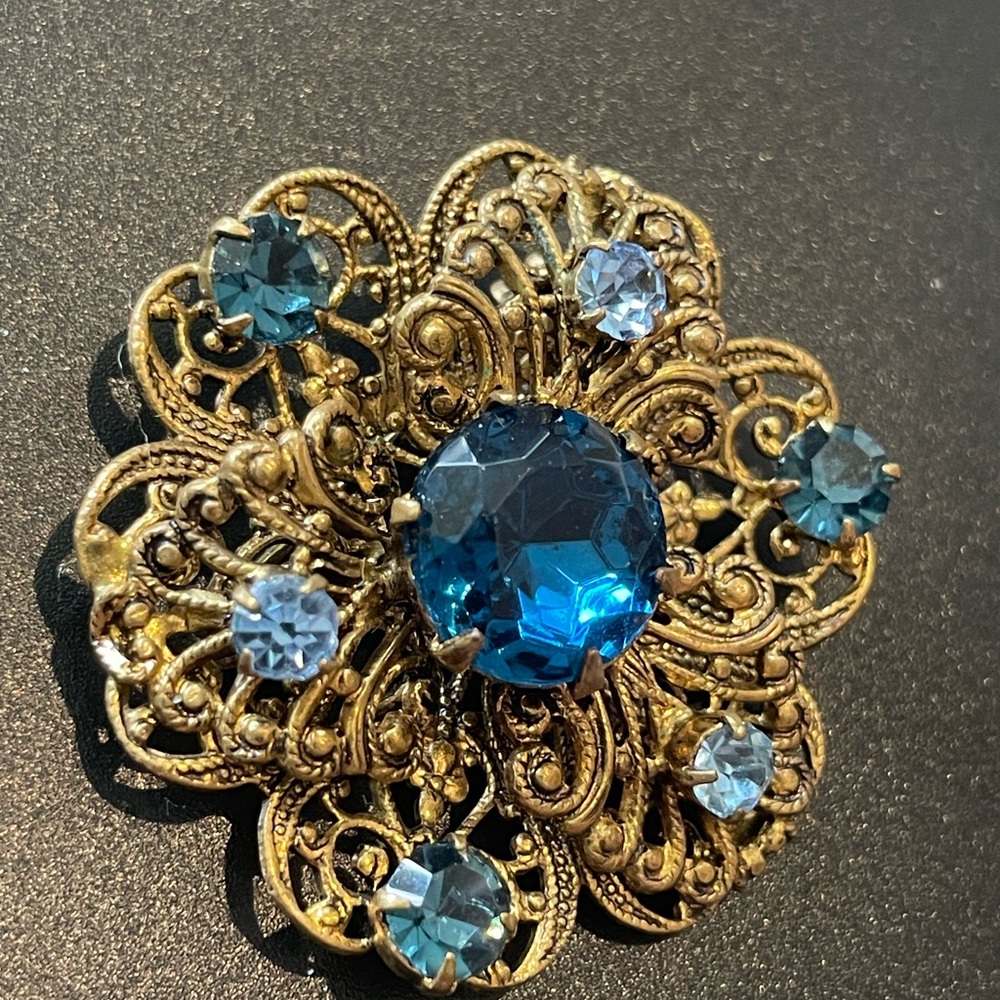 Elegant Gold and Blue Brooch
